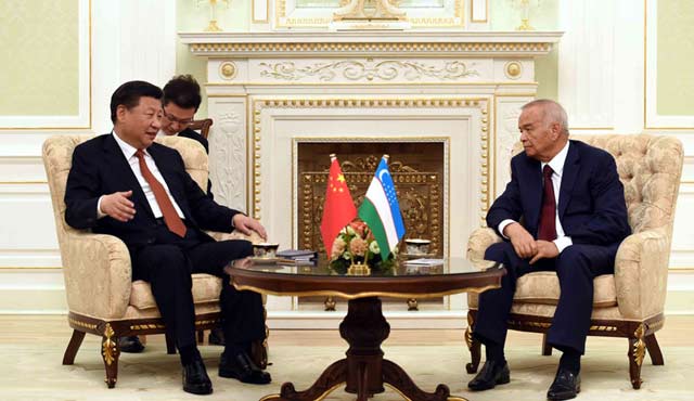 习近平同乌兹别克斯坦总统举行会谈